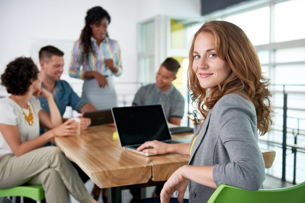 business woman using laptop during meeting